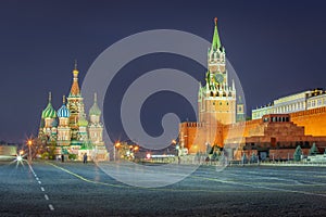 Kremlin and St. Basil's Cathedral at dramatic dawn, red square, Moscow, Russia