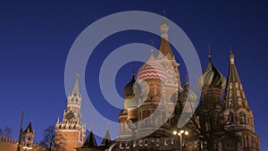 Kremlin tower and Saint Basil Cathedral against dark night sky, picturesque static shot