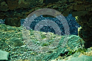 Kreta or Crete, Greece: Blue sea water view through rocky terrain on an inhabited island