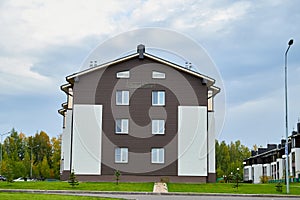 Kriov, Russi - September 08, 2019: Street in a small town, green lawn and houses in a summer