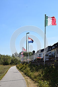 Kripp, Germany - 09 02 2022: Waterfront of Kripp with flags photo