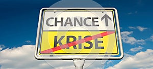 A German place-name sign with the German words `Krise` Crisis and `Chance`