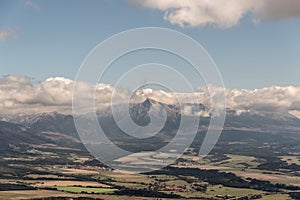Krivan mountain peak in Vysoke Tatry mountains from Predna Poludnica hill in Nizke Tatry mountains in Slovakia photo