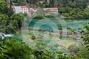 KRKA, CROATIA - MAY 26, 2019: Footbridge over Skradinski Buk waterfall in Krka national park, Croat