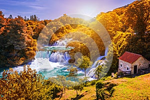 Krka national park with autumn colors of trees, famous travel destination in Dalmatia of Croatia. Krka waterfalls in the Krka