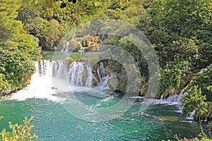 Krka National Park with a beautiful Skradinski Buk waterfall in early autumn, famous travel destination in Dalmatia of Croatia.