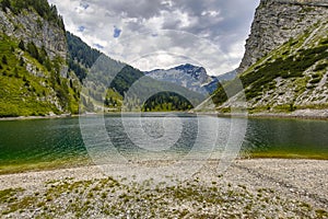 Krnsko jezero lake with mountain Krn