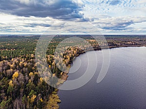 Kroman Lake in Nalibokskaya Pushcha under the stormy sky, Belarus. Drone aerial photo