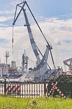 Kronstadt / Russia - 14/07/2018: Boom harbor crane in seaport
