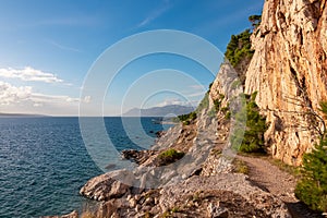 Krvavica - Idyllic hiking trail along steep coastal cliffs from Krvavica to Makarska, Dalmatia, Croatia, Europe