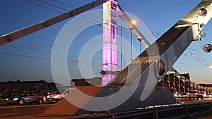 Krymsky Bridge or Crimean Bridge and traffic of cars (night)-- is a steel suspension bridge in Moscow, Russia