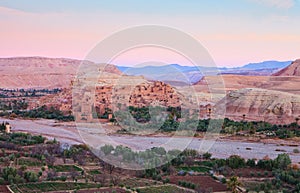 Ksar of Ait-Ben-Haddou and surroundings at dawn, Morocco. Ait-Ben-Haddou along the bank of a parched river