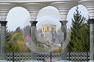 Ksido castle through collonade, Khmilnyk