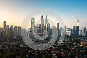 Kuala Lumpur city skyline and skyscrapers building during sunrise at business district downtown in Kuala Lumpur, Malaysia. Asia