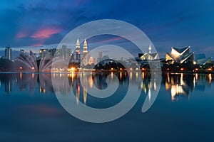 Kuala Lumpur Cityscape. image of Kuala Lumpur, Malaysia during sunset at Titiwangsa park with fountain