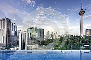 Kuala Lumpur cityscape,with KL Tower,viewed from rooftop swimming pool,Malaysia