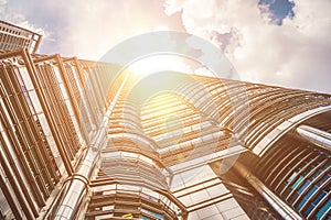 KUALA LUMPUR, MALAYSIA - 24 FEBRUARY 2017: Abstract view of a skyscraper with sunlight