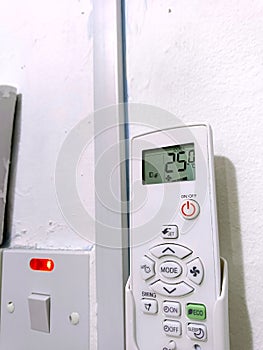 Kuala Lumpur, Malaysia - april 2024: Isolated picture Air conditioner remote controller.