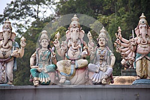 KUALA LUMPUR, MALAYSIA - AUGUST 23, 2013: Lord Ganesh Ganesha, Statues of Hindu deity in the temple of Batu Caves, a