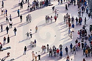 City square with daily life in big town - people crowd who spend their free time, interact with each other.