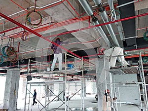 Installation of electrical services, conduit, cable tray and wire-ring at the high leve