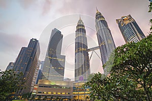 Sunset at Kuala Lumpur city skyline with Petronas KLCC Twin Towers