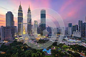 Kuala Lumpur skyline financial downtown district and KLCC park