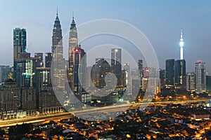 Kuala Lumpur skyline and skyscraper with highway road at night in Kuala Lumpur, Malaysia. Asia