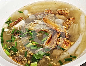 Kuay Jap, large noodles with crispy pork photo