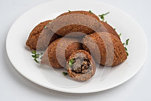 Kubbeh also known as kubbe or kibbeh photo
