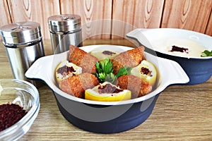 Kubbeh snack in a bowl photo