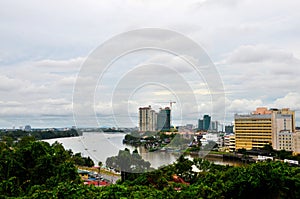 Skyline buildings with Sarawak River of Kuching Sarawak Borneo East Malaysia