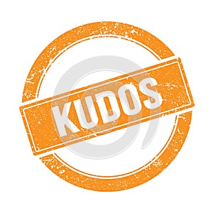 KUDOS text on orange grungy round stamp