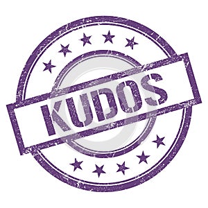 KUDOS text written on purple violet vintage stamp