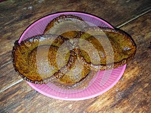 Kue cucur, Indonesian traditional cake, made from rice flour and brown sugar, sweet cake, dessert, snack, street food