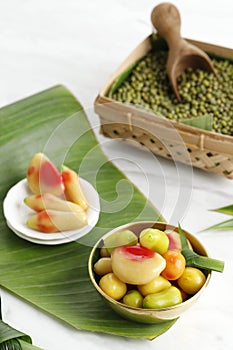 Kue Ku Buah Mini Fantasi,  Popular Thai as Kaoom Lok Choup. Sweet Dumpling made from Mashed Mung Bean with Jelly Gelatin  Skin