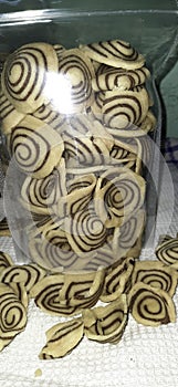 Kue kuping gajah or Indonesian traditional striped cookies.