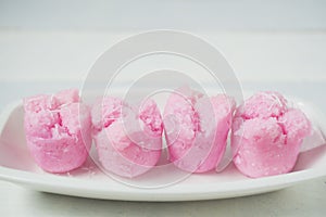 Kue Mangkok or kue mangkuk, against white background