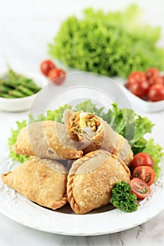 Kue Pastel or Jalangkote, Popular Dish from South East Asia as Curry puff. This snack filled with Rice Noodles, Carrot, Potatoe