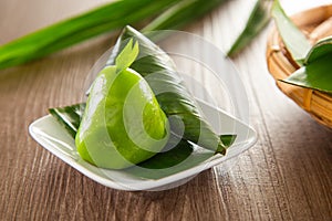 Kuih Koci, traditional Malaysian Nyonya sweet cake. Made from glutinous rice flour with coconut filling, wrapped in banana leaves