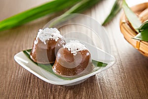 Kuih kosui, traditional Malaysian Nyonya sweet dessert cake. It is best eaten with freshly grated coconut