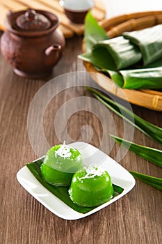 Kuih kosui, traditional Malaysian Nyonya sweet dessert cake. It is best eaten with freshly grated coconut
