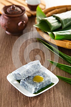 Kuih Pulut Tai Tai. Peranakan blue glutinous rice cake with kaya jam