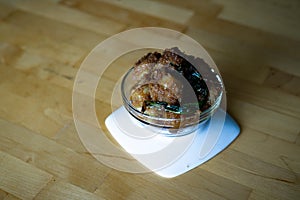 Kuih Puteri Mandi served on a bowl. Famous food during Ramadan in Kelantan, Malaysia. Made from glutinous rice flour, coconut,