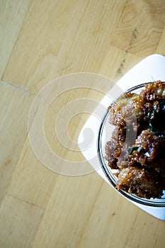 Kuih Puteri Mandi served on a bowl. Famous food during Ramadan in Kelantan, Malaysia. Made from glutinous rice flour, coconut,