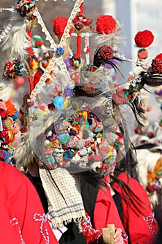 Kukeri, mummers perform rituals to scare away evil spirits during the international festival of masquerade games â€Survaâ€