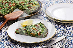 Kuku sabzi (herb frittata), vegetarian Iranian food photo