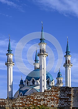 Kul Sharif Mosque from behind an old brick wall in the Kazan Kremlin, Russia