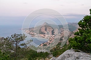 Kula - Scenic aerial view of coastal town Omis surrounded by Dinara mountains in Split-Dalmatia, South Croatia. Hiking trail