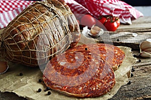 Kulen. Croatian spicy sausage on wooden board